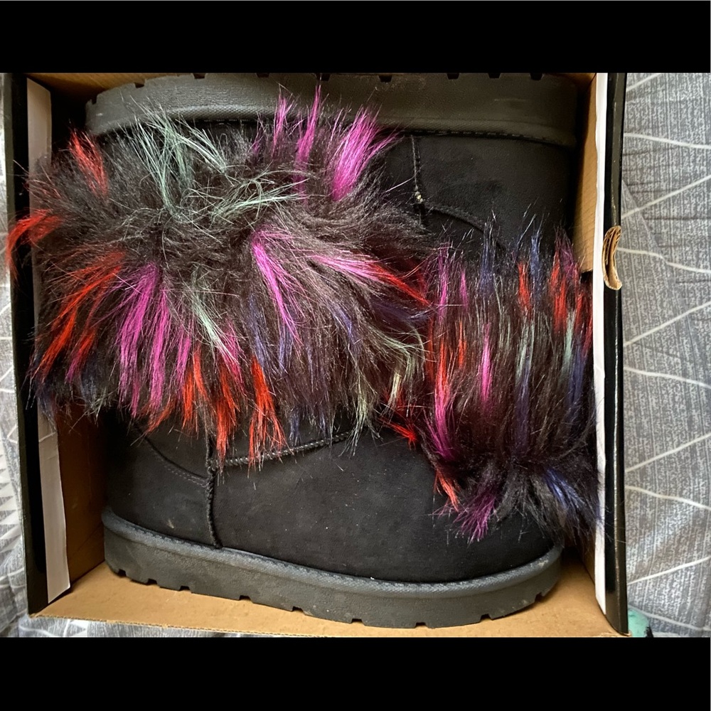 Fuzzy winter UGG like boots. Very warm and cozy.